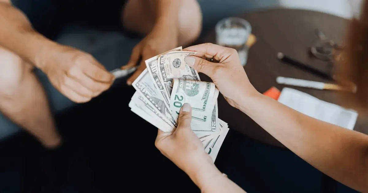 Person counting money